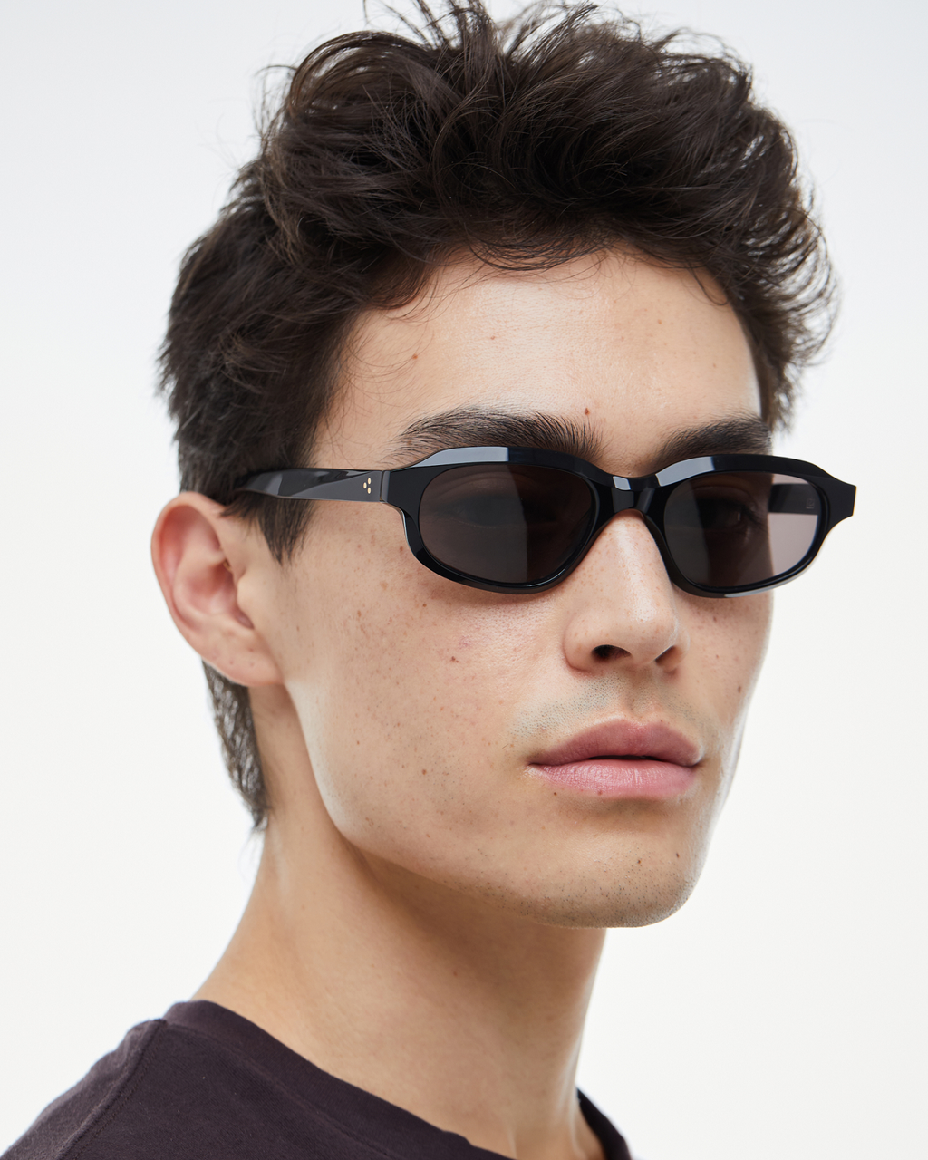 Black sunglasses with a white background